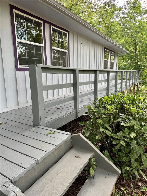 view of side of property with a deck