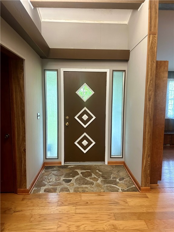 foyer entrance with light wood-type flooring