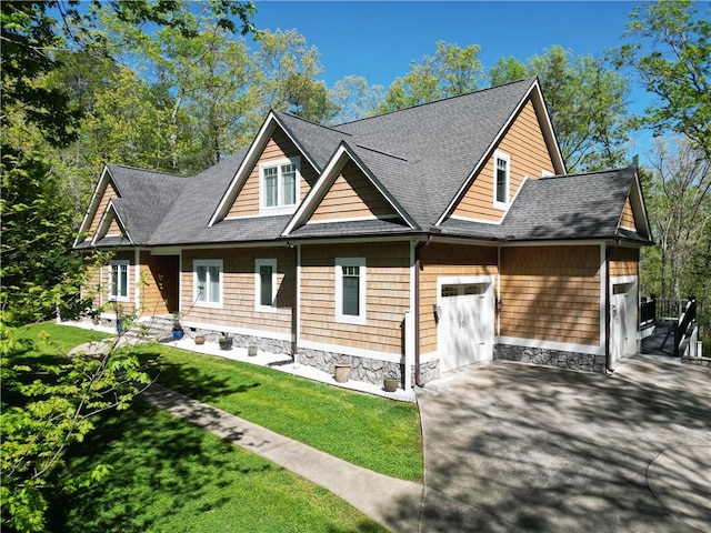 exterior space with a lawn and a garage