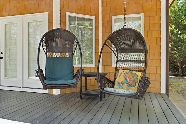 wooden deck featuring french doors