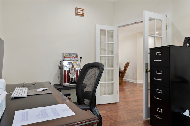 office area featuring french doors and dark hardwood / wood-style floors