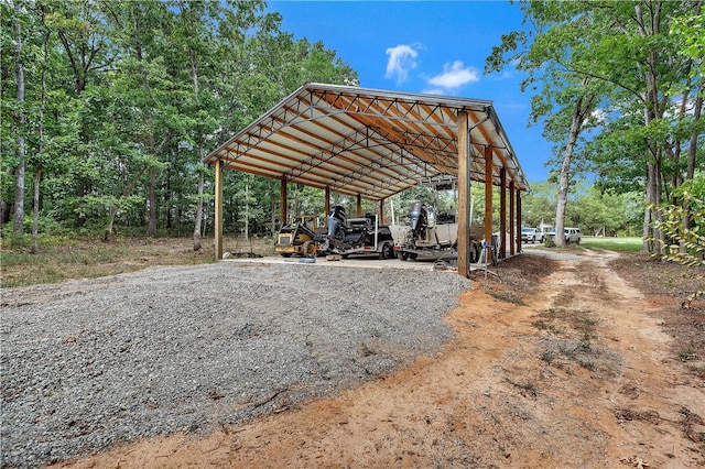 exterior space with a carport