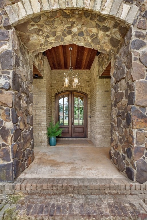 entrance to property featuring french doors