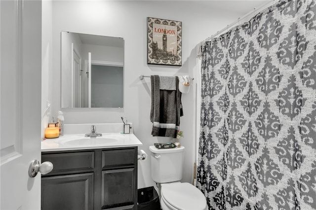 bathroom with vanity and toilet