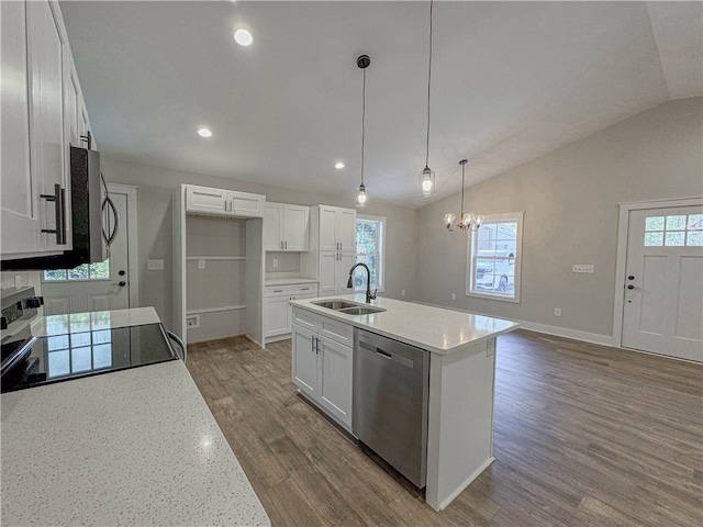 kitchen featuring white cabinets, stainless steel appliances, sink, and a wealth of natural light