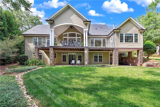 back of property featuring french doors and a yard