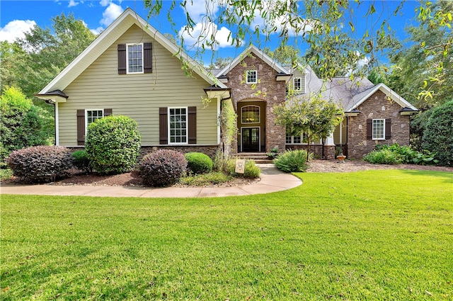 view of property with a front lawn