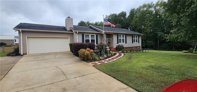 ranch-style home with a front yard and a garage