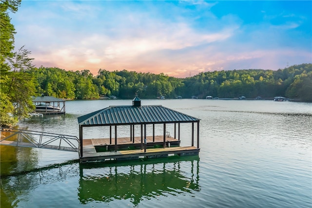 view of dock with a water view