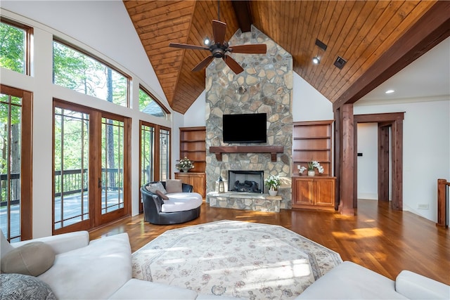 living room with wood-type flooring, beam ceiling, a fireplace, high vaulted ceiling, and wooden ceiling