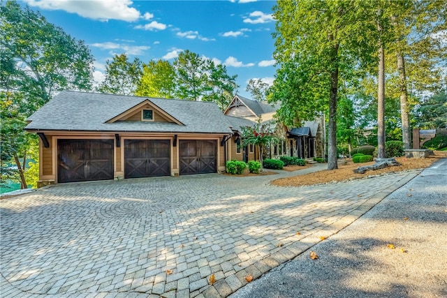 view of front of property with a garage