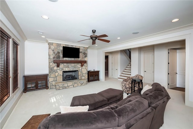 606 Majesty Ct, Salem, SC 29676 - carpeted living room featuring ceiling fan, a stone fireplace, stairway, ornamental molding, and recessed lighting