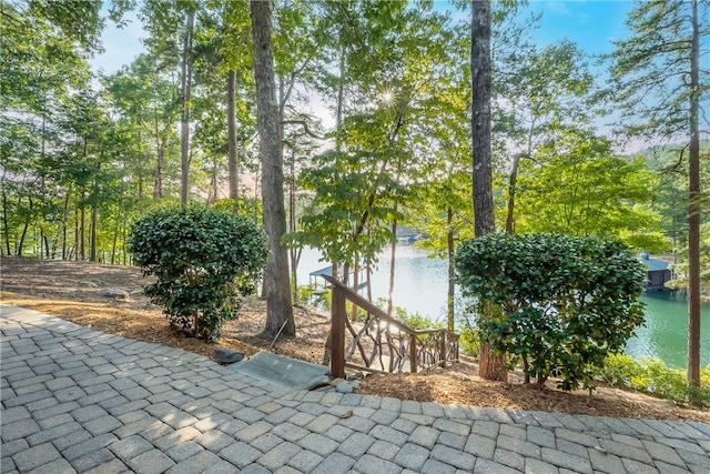 view of patio / terrace featuring a water view