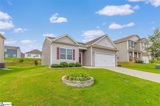 view of front of home featuring a garage and a front lawn