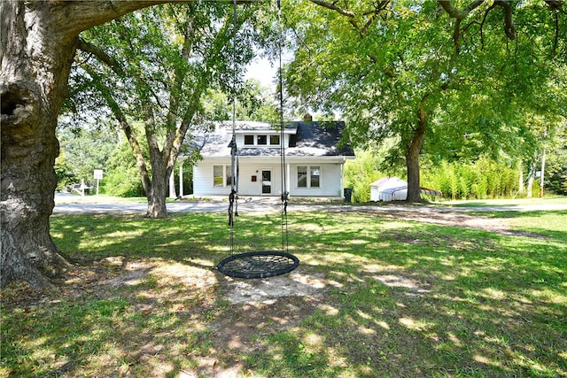 view of front of house with a front lawn