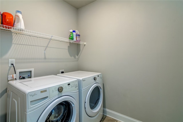 laundry area featuring separate washer and dryer