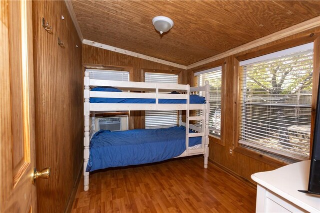 unfurnished bedroom with wood ceiling, wooden walls, lofted ceiling, and wood-type flooring