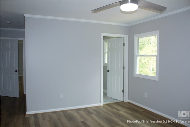 unfurnished room with dark hardwood / wood-style flooring, ceiling fan, and ornamental molding