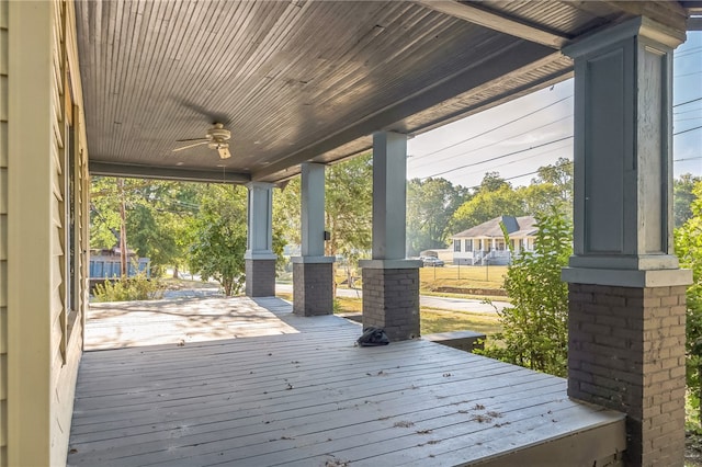 deck featuring ceiling fan and covered porch