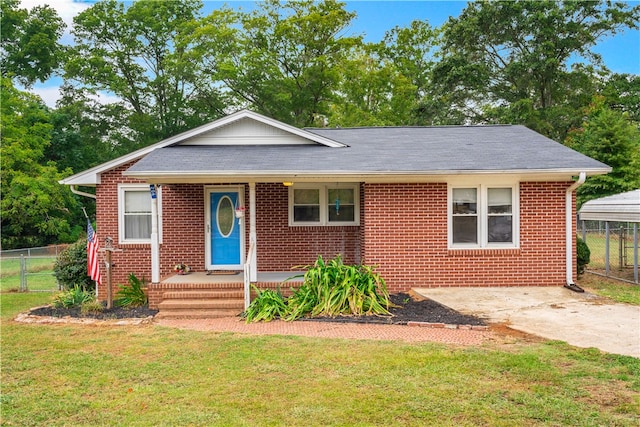 bungalow-style house featuring a front lawn