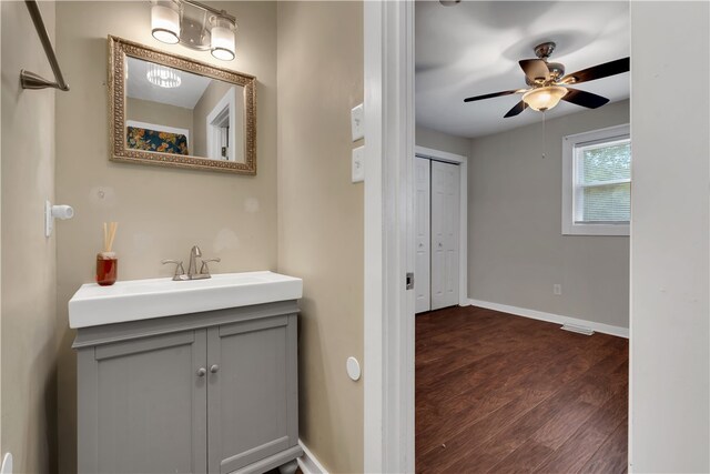 bathroom featuring vanity, ceiling fan, and hardwood / wood-style flooring