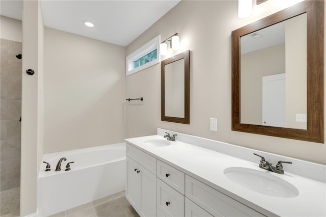 bathroom featuring vanity, tile patterned flooring, and separate shower and tub