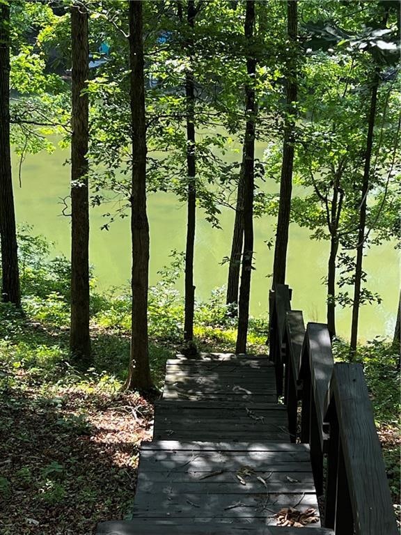 view of home's community featuring a water view