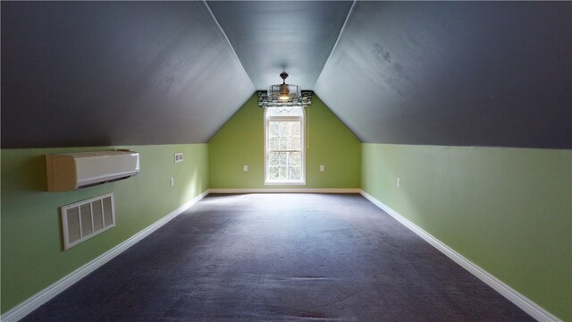 additional living space with carpet floors and lofted ceiling