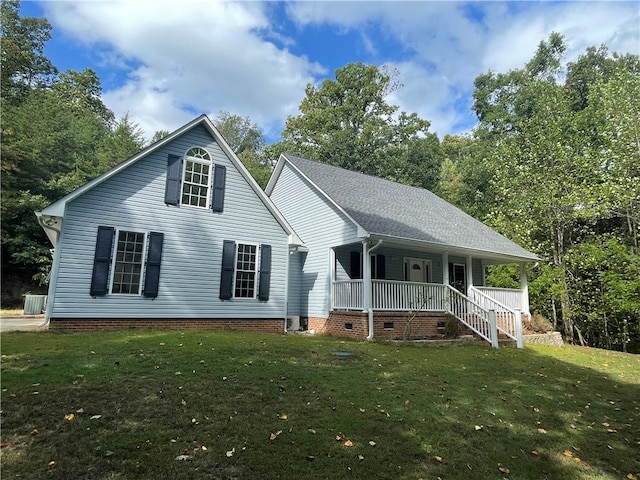 view of front of home featuring covered porch and a front lawn