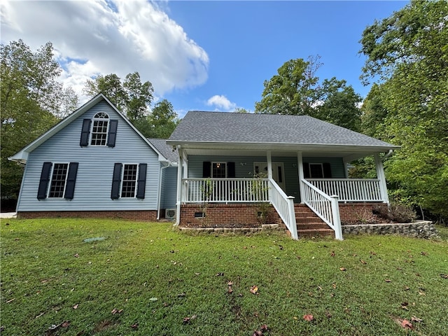 bungalow-style house with a porch, a front lawn, and a shingled roof