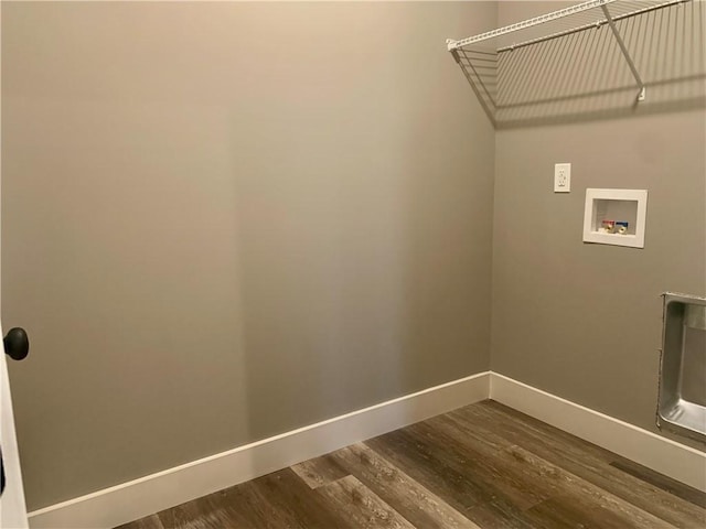 clothes washing area with hookup for a washing machine, laundry area, baseboards, and dark wood-style floors