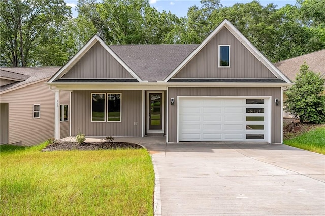 156 Grand Oak Cir, Pendleton, SC 29670 - view of front facade with a porch, roof with shingles, a front yard, concrete driveway, and an attached garage