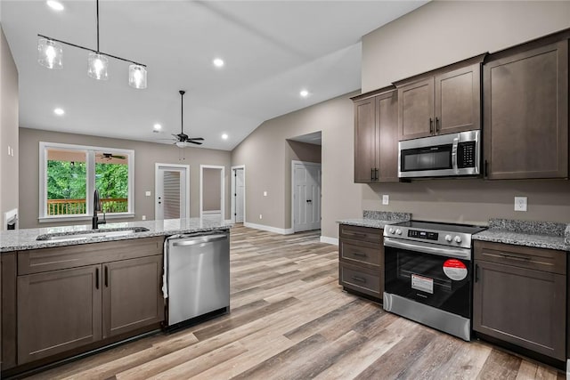 156 Grand Oak Cir, Pendleton, SC 29670 - kitchen with dark brown cabinets, light wood-style floors, ceiling fan, a sink, and stainless steel appliances