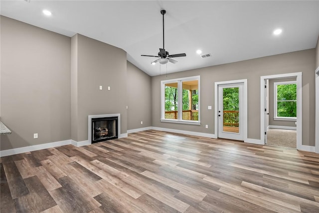 156 Grand Oak Cir, Pendleton, SC 29670 - unfurnished living room featuring wood finished floors, a fireplace, baseboards, a ceiling fan, and vaulted ceiling
