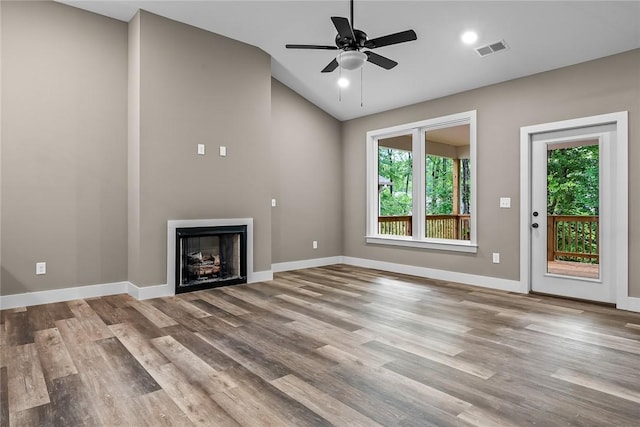 156 Grand Oak Cir, Pendleton, SC 29670 - unfurnished living room with a fireplace, a ceiling fan, wood finished floors, lofted ceiling, and visible vents