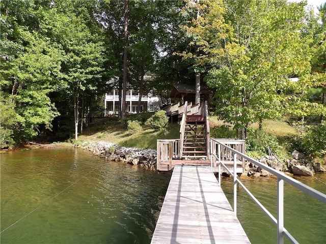 dock area with a water view