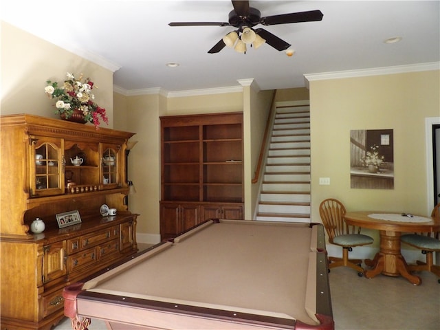 recreation room featuring pool table, crown molding, and ceiling fan