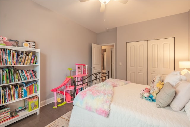 bedroom featuring ceiling fan, a closet, and hardwood / wood-style floors