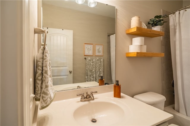 full bathroom with vanity, toilet, and shower / bath combo