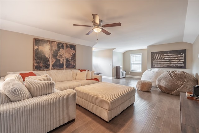 living room featuring lofted ceiling, hardwood / wood-style floors, and ceiling fan