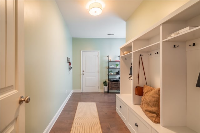 mudroom with dark hardwood / wood-style floors