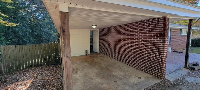 view of patio / terrace featuring a carport