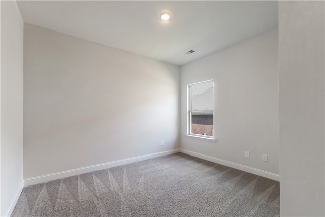 view of carpeted spare room