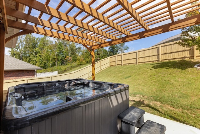 wooden deck with a pergola, a lawn, and a hot tub