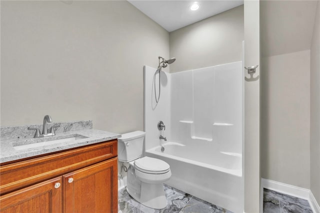 full bathroom featuring vanity, toilet, and washtub / shower combination