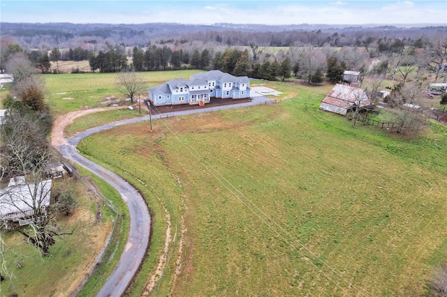 birds eye view of property featuring a rural view