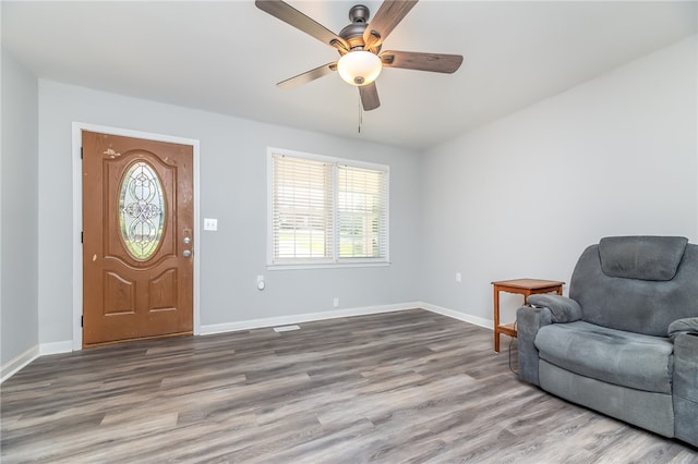 entrance foyer with wood-type flooring and ceiling fan