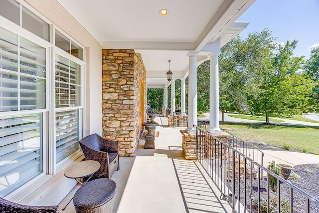 view of patio featuring a porch