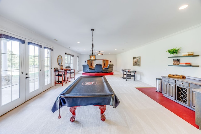 playroom with pool table, ceiling fan, light colored carpet, and crown molding