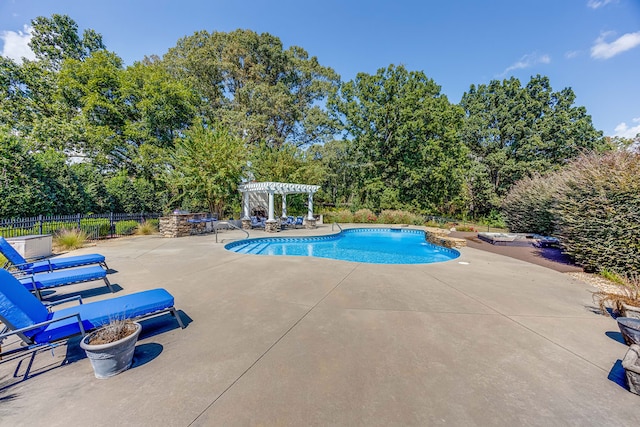 view of pool featuring a patio and a pergola